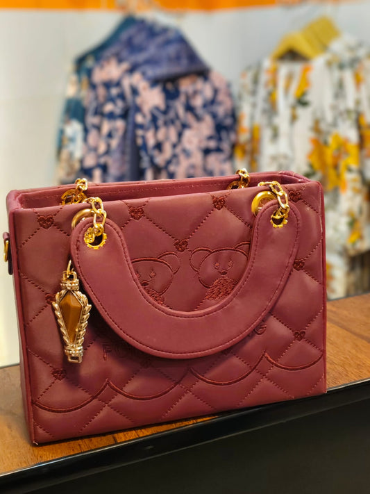 Bear-Embossed Quilted Satchel