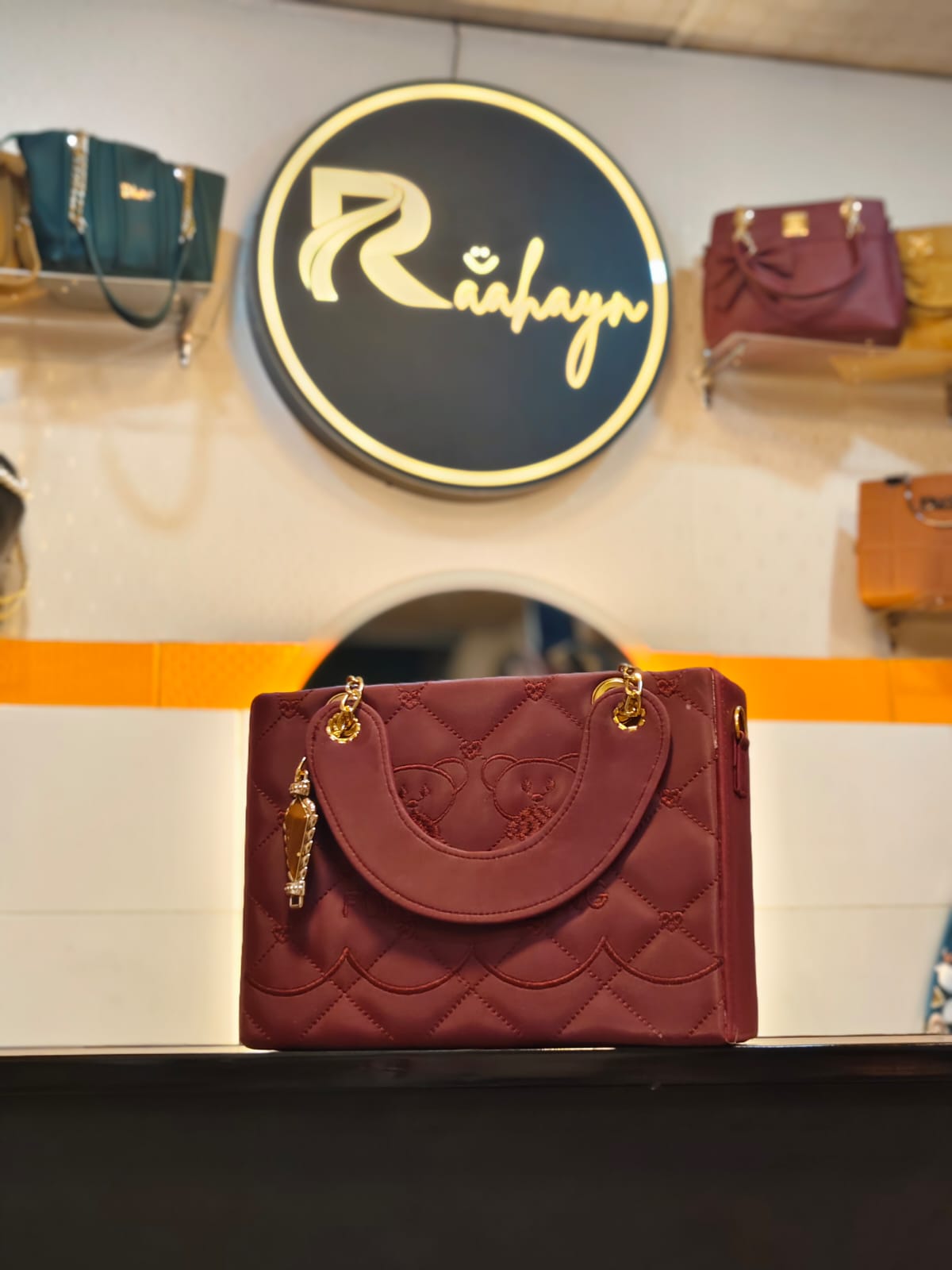 Bear-Embossed Quilted Satchel